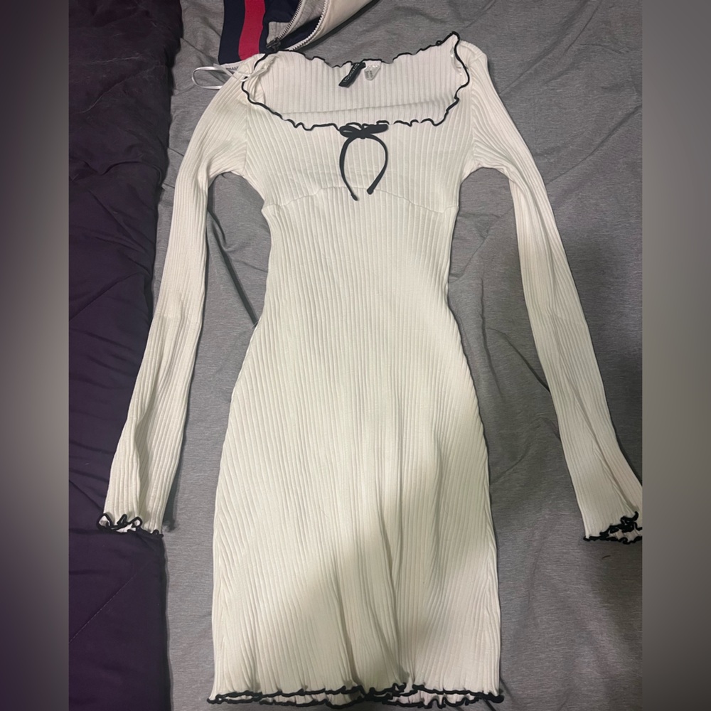 white long sleeve tight dress with a bow